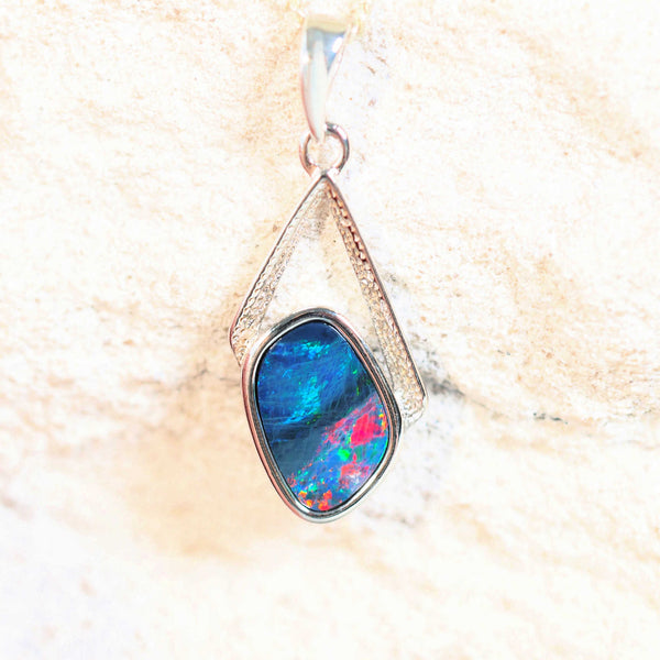 red and blue and green opal pendant